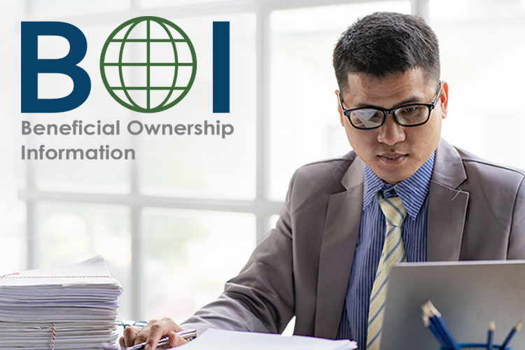 Young Asian businessman working with piles of papers on the desk of financial business ideas.